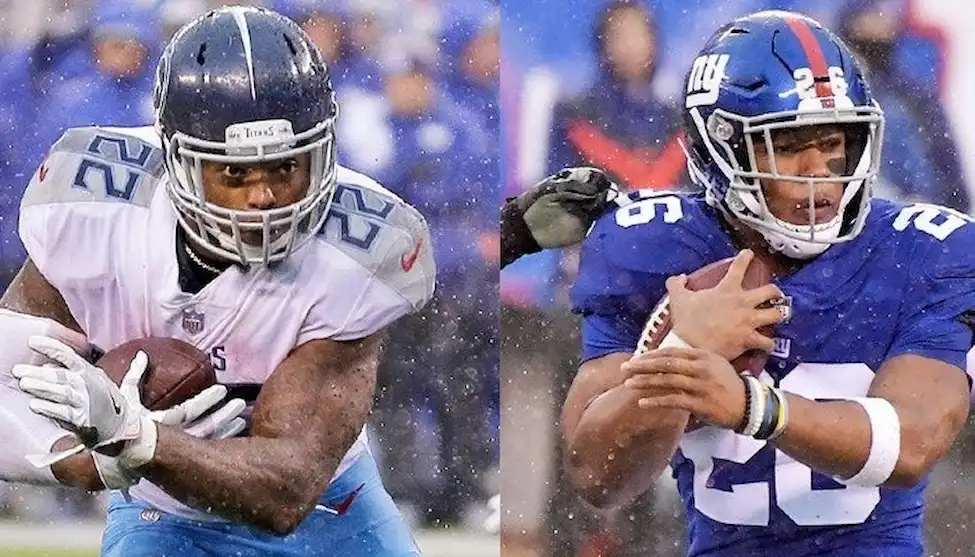 Two running backs holding the football during an NFL game.