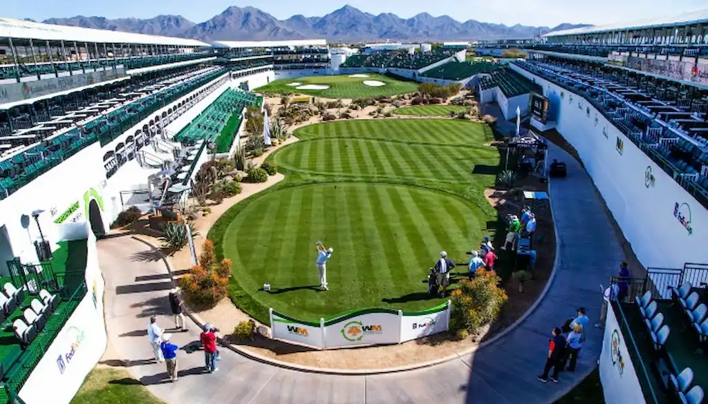 A golfer tees off at the iconic 16th hole of TPC Scottsdale during the WM Phoenix Open.