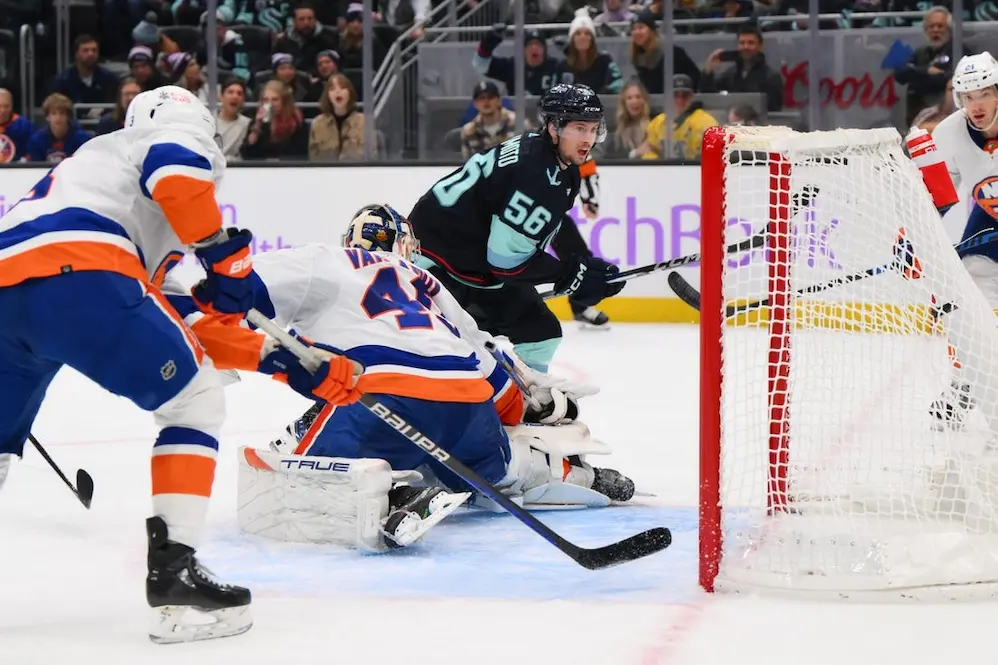 kraken player making a goal