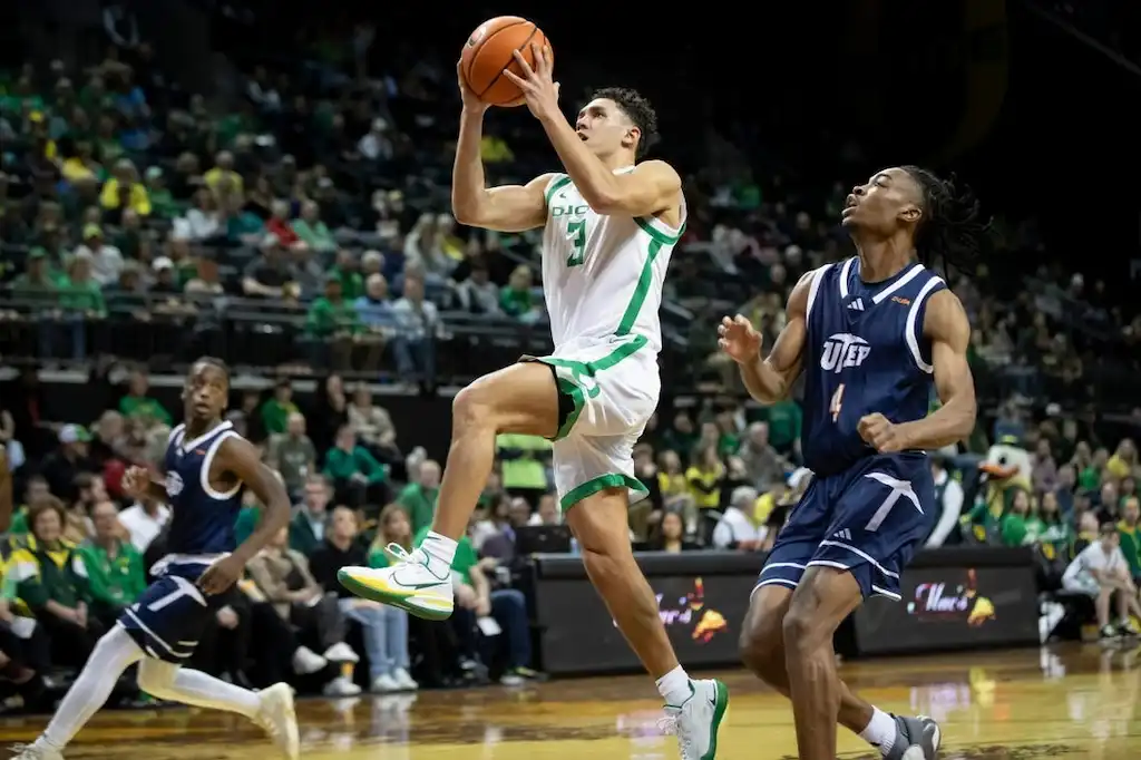Oregon player elevates for a layup.