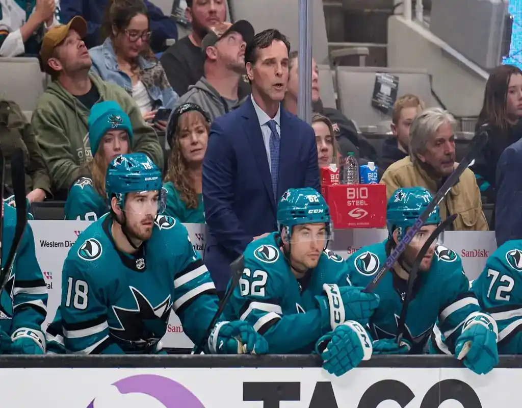 San Jose Sharks coach and players on the bench during the game against the Colorado Avalanche on December 17, 2023