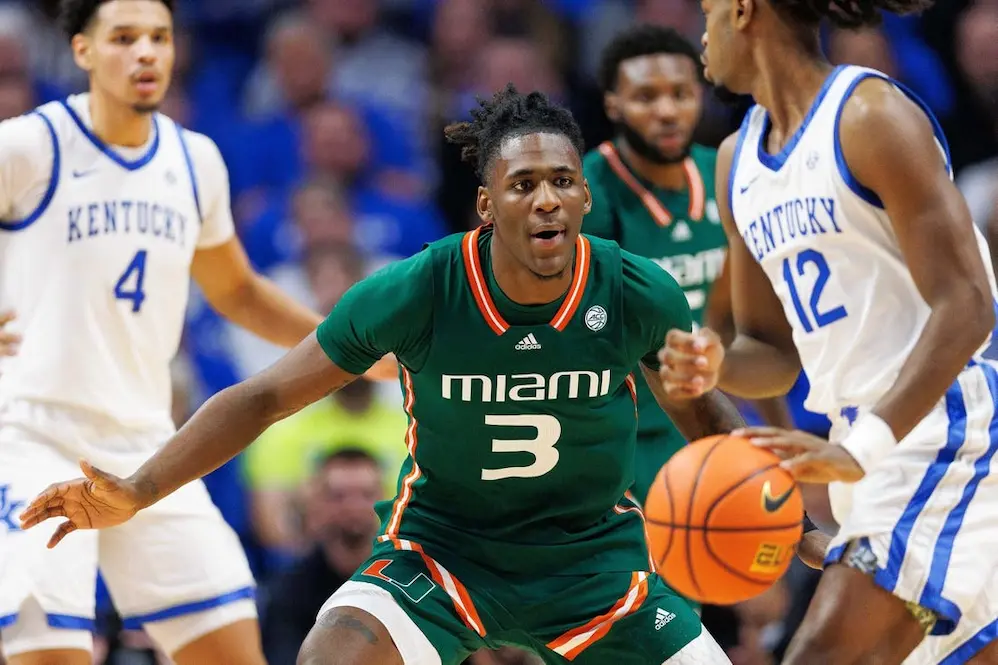 NCAAB 3 miami ncaab player preparing to chatch the ball