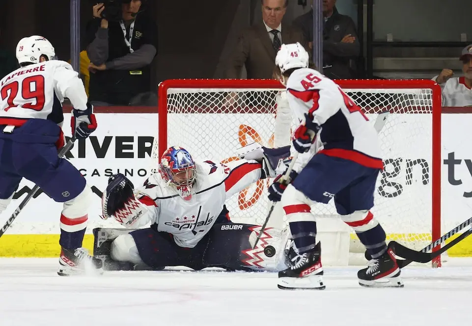 NHL 4 washington capitals goalie trying to block a goal