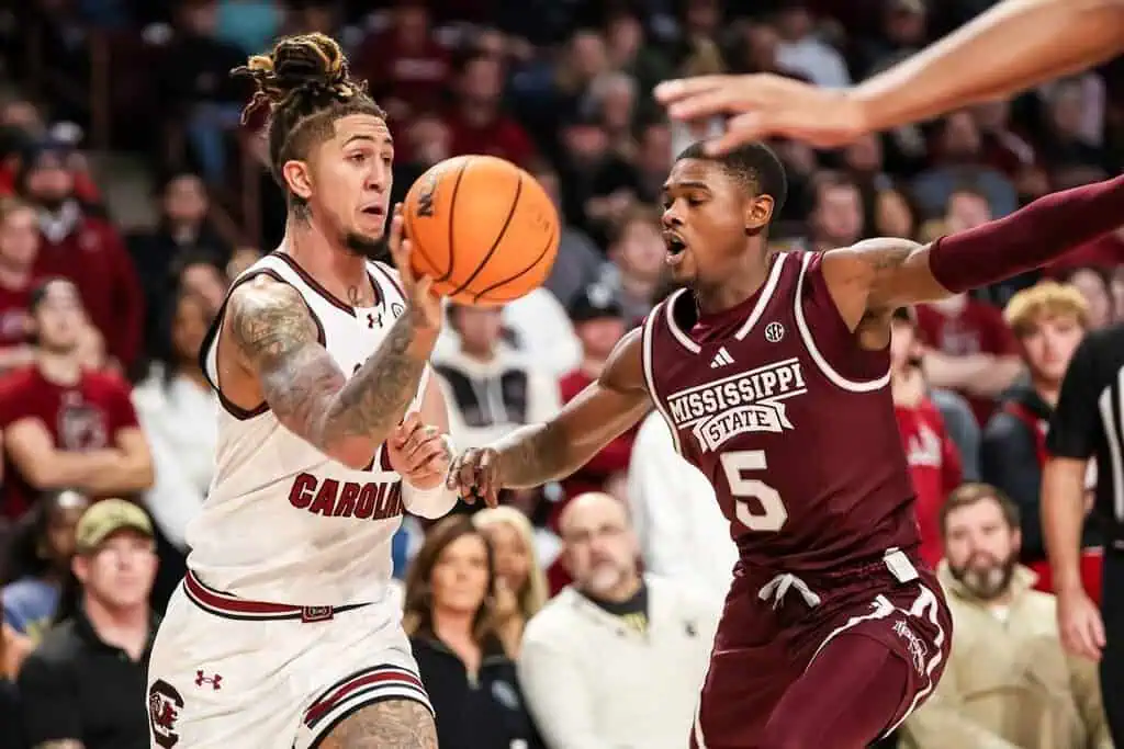 South Carolina and Mississippi State players battle for possession during an NCAA basketball game.