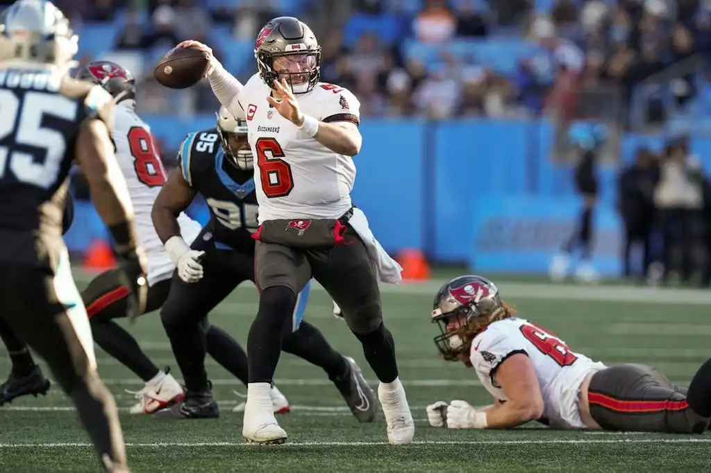 A Tampa Bay Buccaneers quarterback winds up to throw a pass.