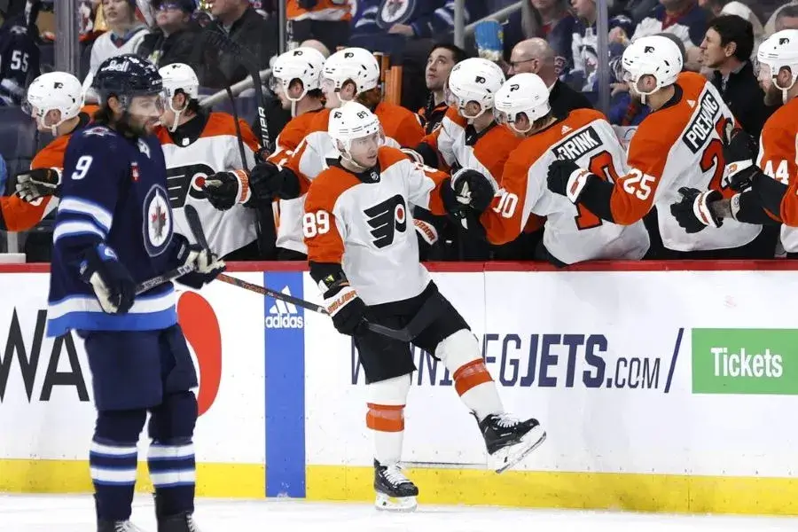 NHL 5 flyers player being saluted by his teammates