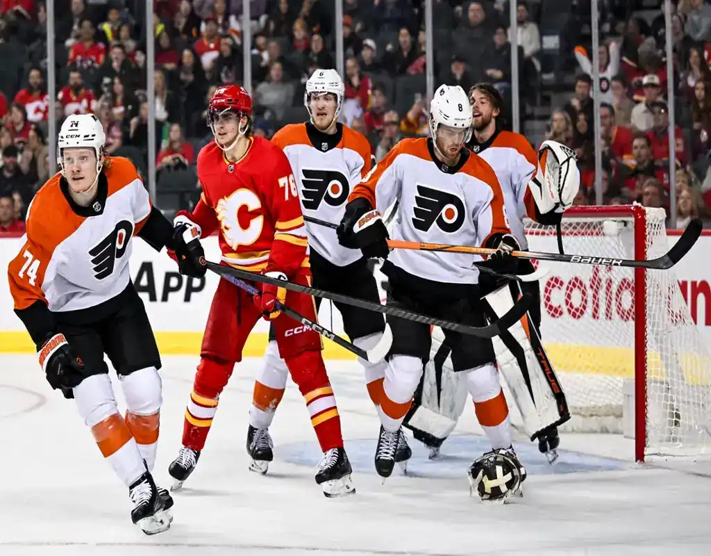 Philadelphia Flyers defend the net against Calgary Flames during NHL game on January 6, 2024