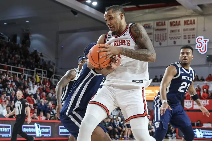 NCAAB 6 st johns ncaab player holding the ball