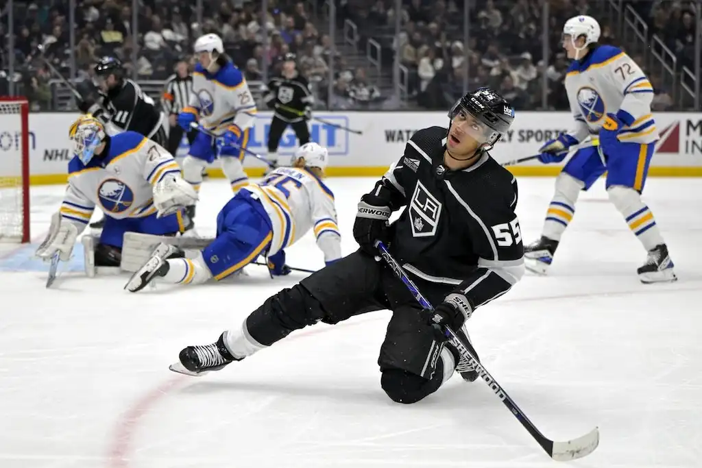 NHL 10 Los Angeles Kings player celebrates on the ice.