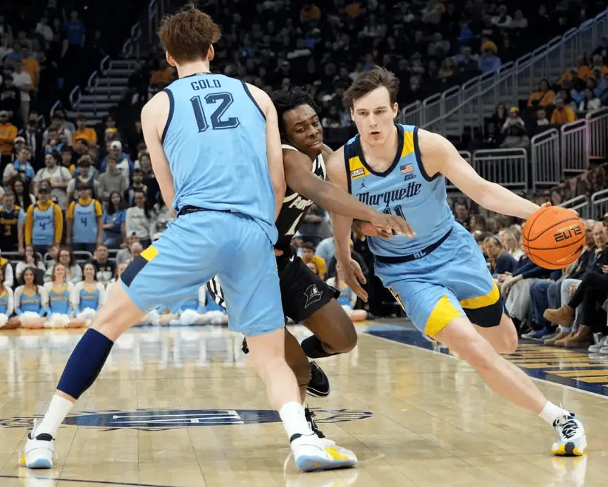 NCAAB 8 College basketball matchup between the Marquette Golden Eagles and Connecticut Huskies with expert pick and prediction for March 6th 2024.