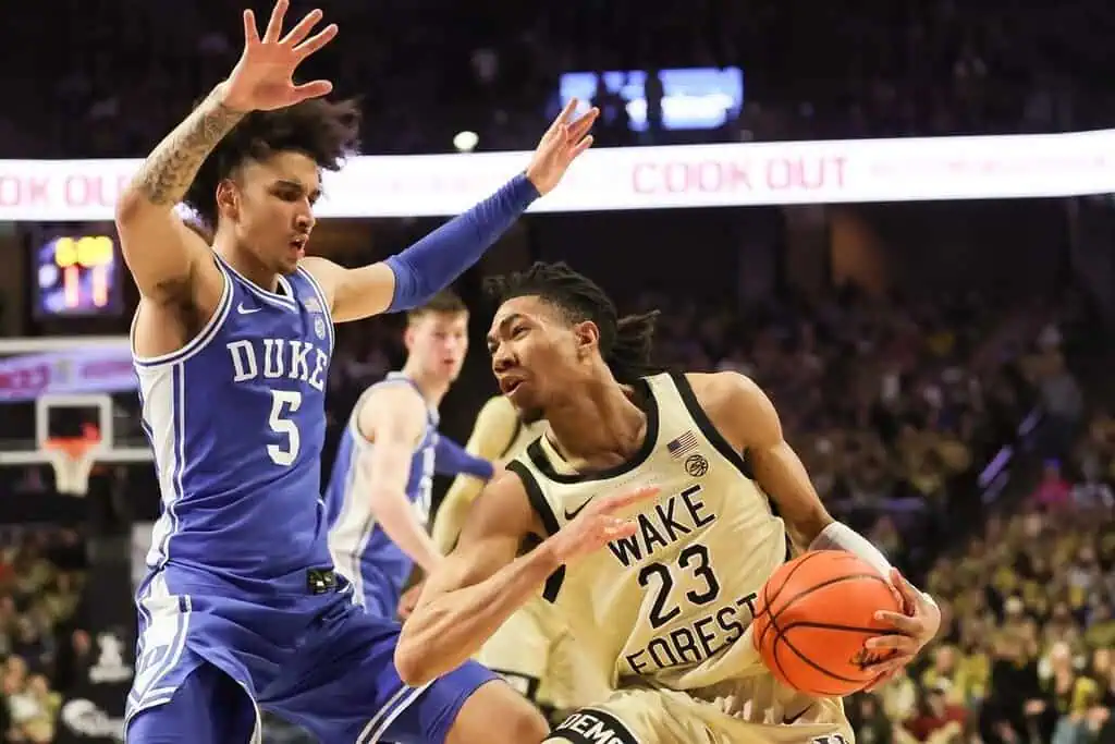 Heated college basketball matchup between the Duke Blue Devils and the Wake Forest Demon Deacons.