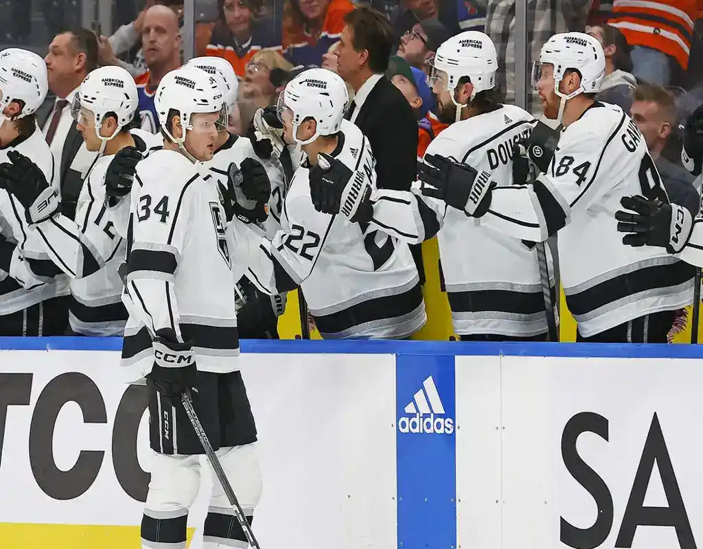 Los Angeles Kings players celebrate on the bench during their game against the Calgary Flames on March 30, 2024.