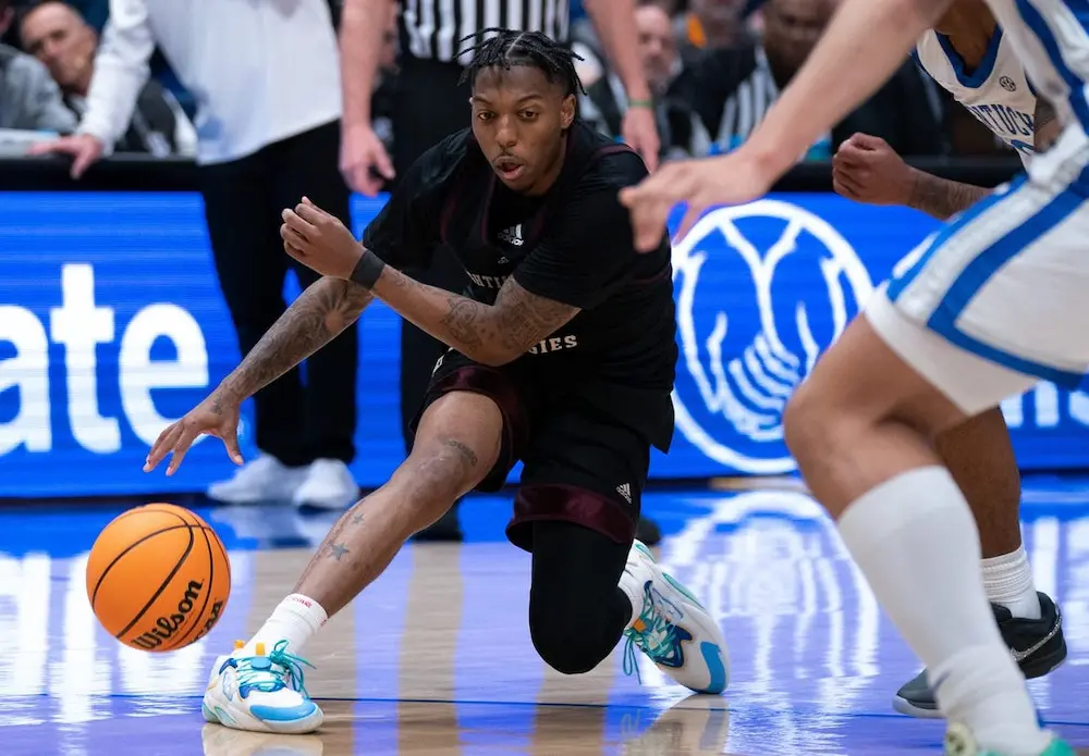 ncaab player dribbling