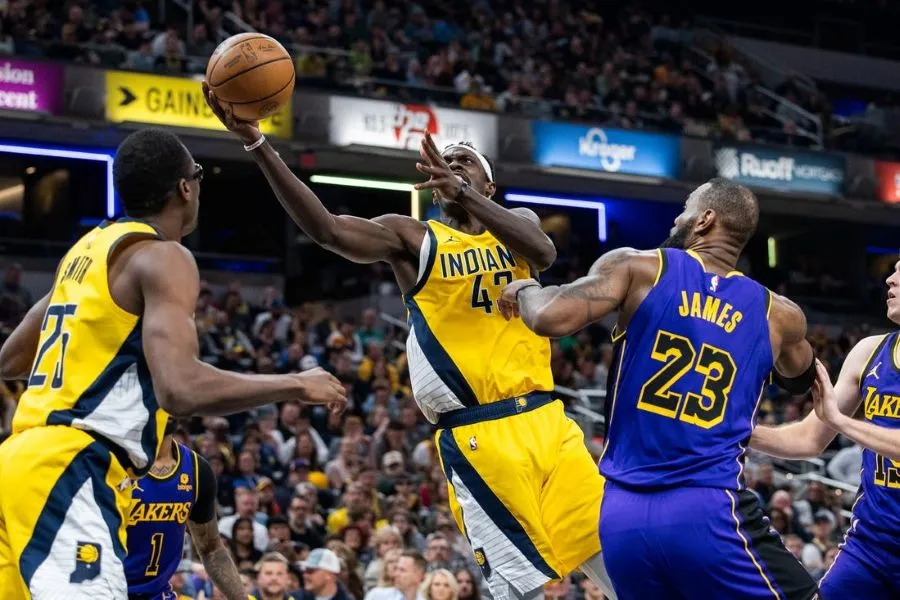 pacers player evading lebron and scoring a point
