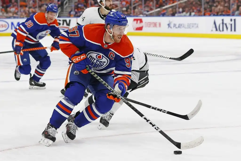 Edmonton Oilers captain Connor McDavid skates with the puck during a game.
