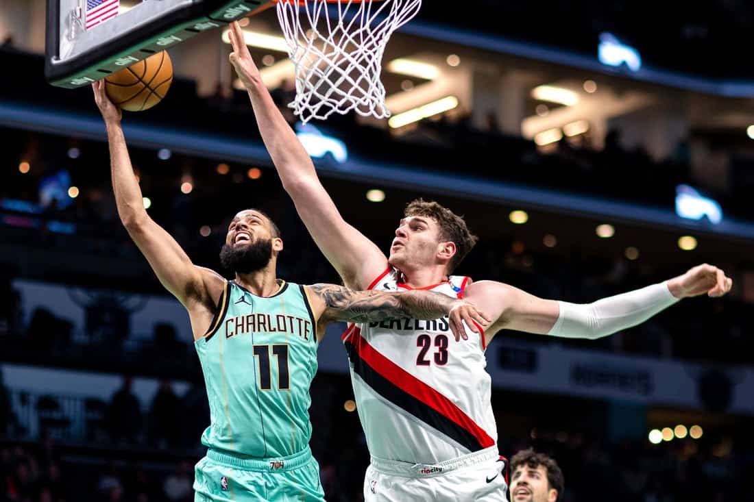 2 Trailblazers player blocking