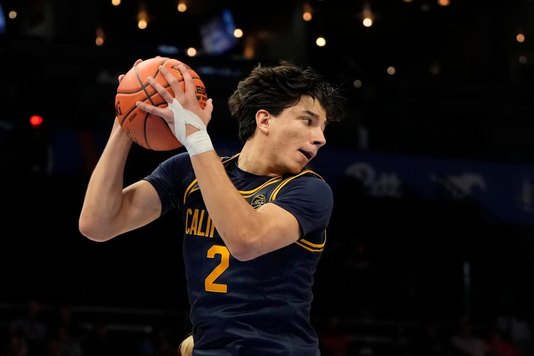 Golden Bears player Holding the ball