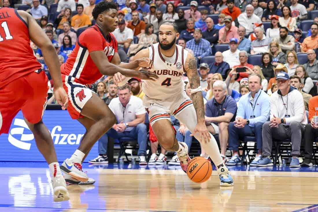 NCAAB 3 Auburn player dribbling