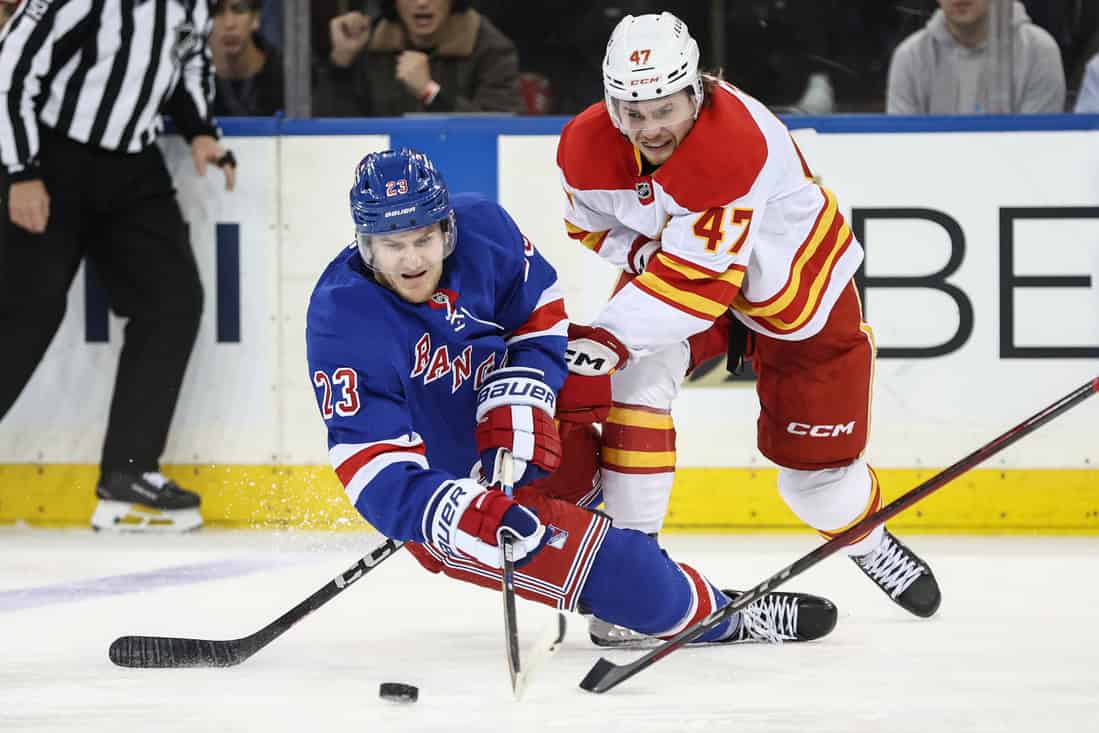 Rangers PLAYER CONTESTING THE PUCK