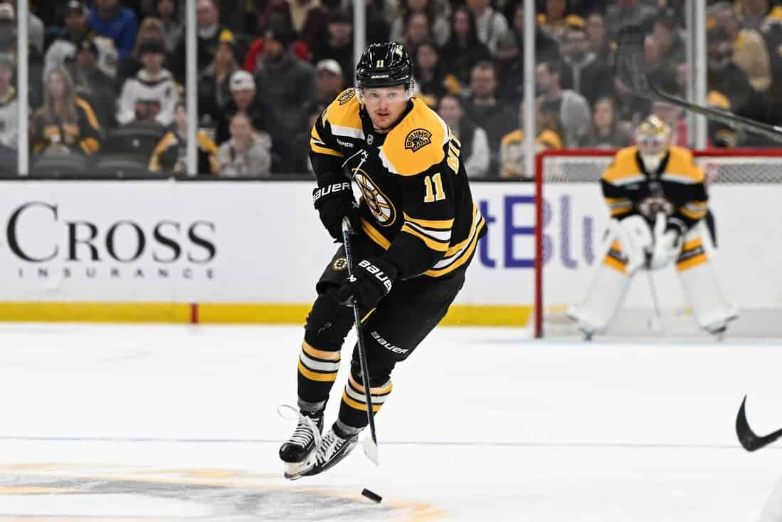 Bruins player dribbling