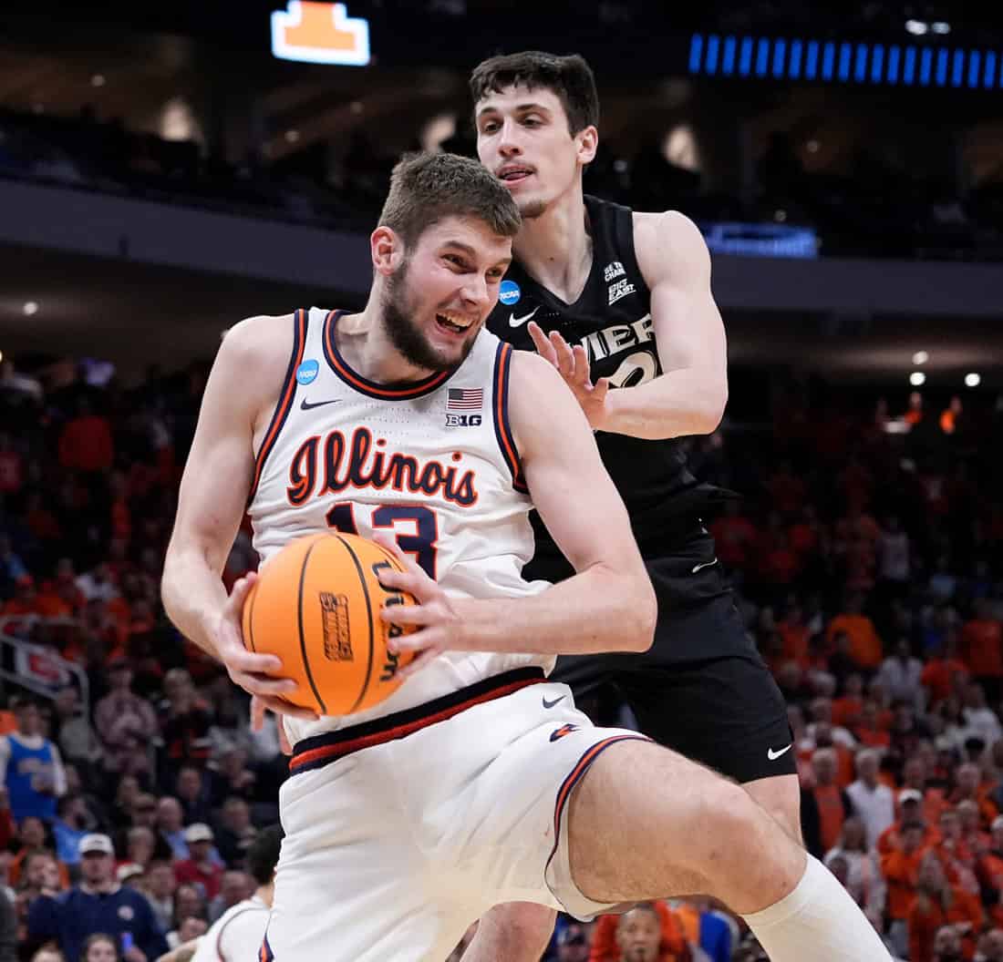 Illlinois Player Guarding the ball