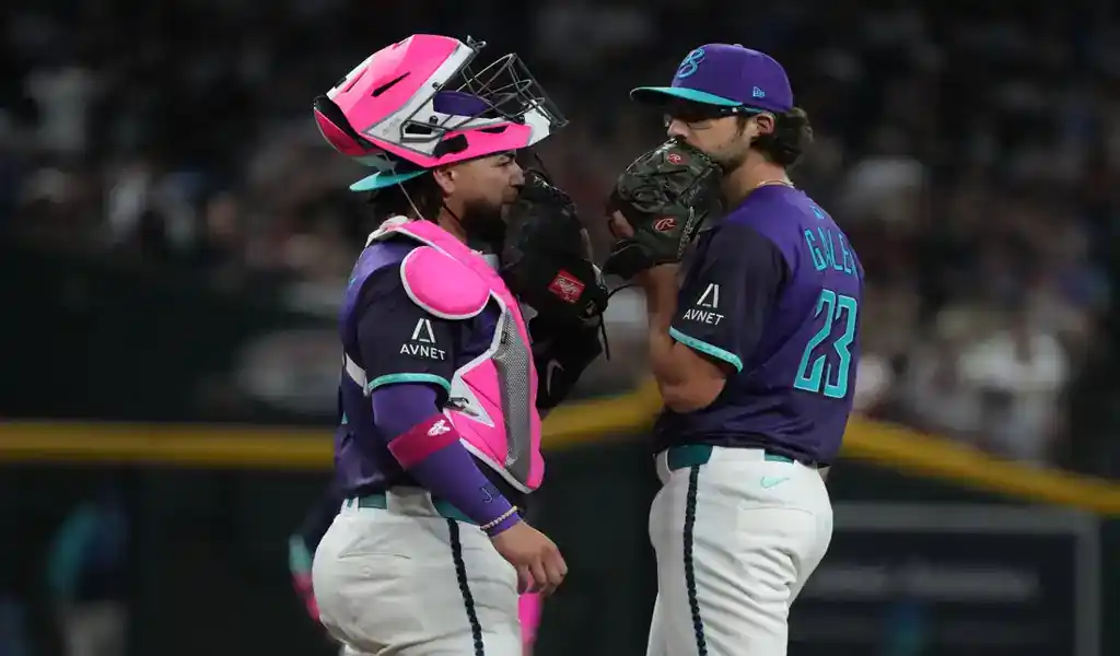 Arizona Diamondbacks catcher and pitcher discuss strategy during game against St. Louis Cardinals on May 23, 2025.