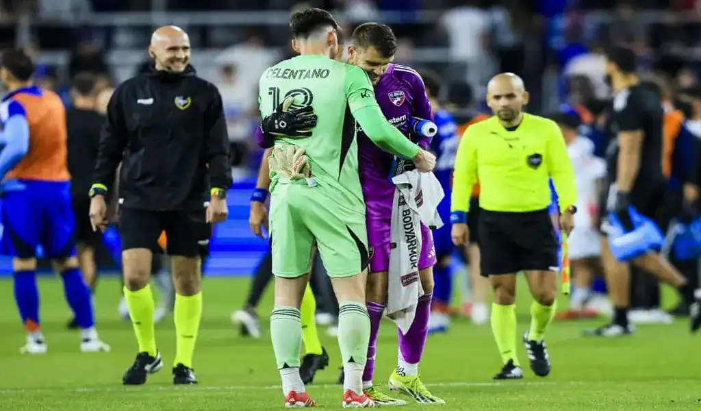 FC Cincinnati and DC United goalkeepers embrace after the match