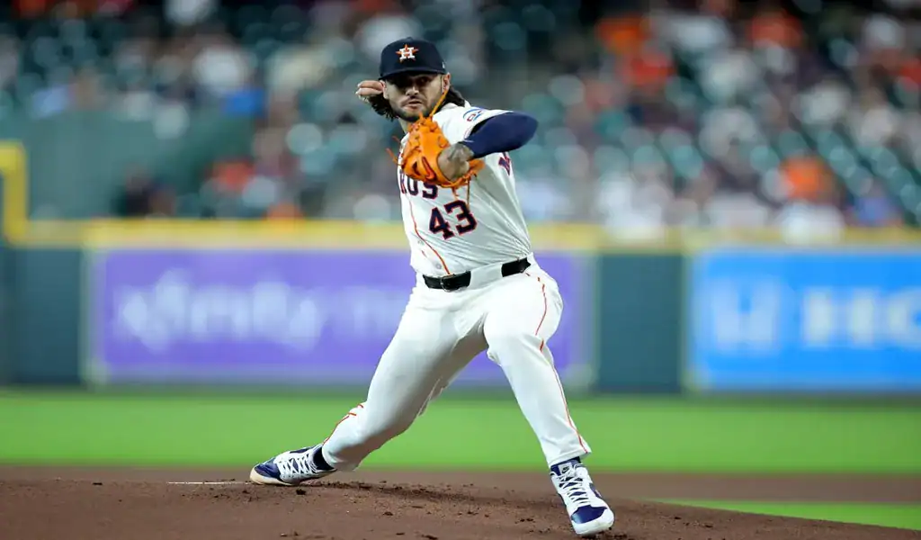Houston Astros pitcher throws a pitch during game vs Athletics