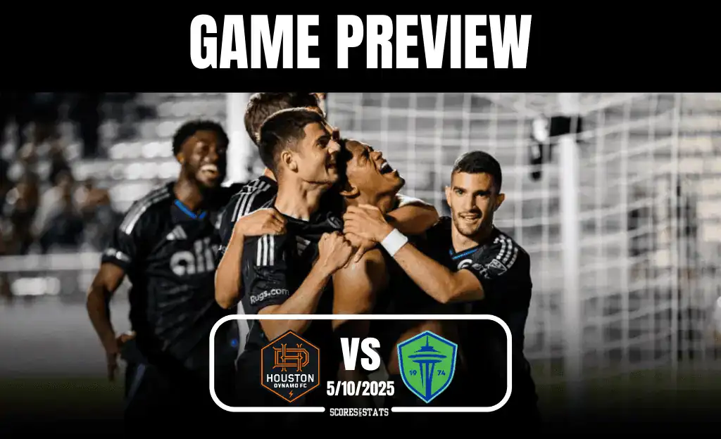 A group of soccer players celebrate a goal, with the Houston Dynamo logo and Seattle Sounders logo prominently displayed below.