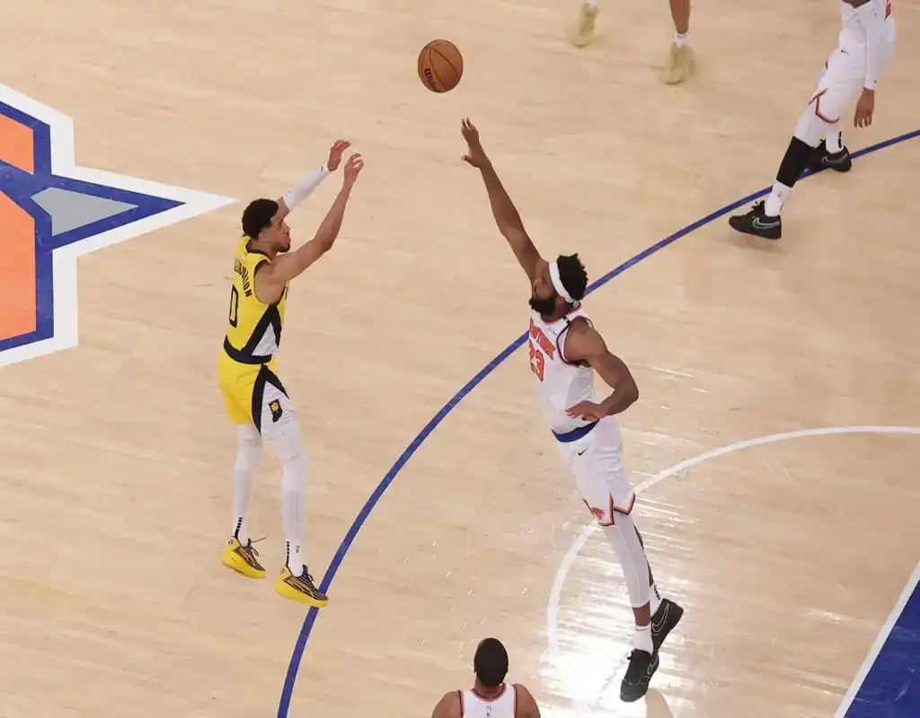 5 Indiana Pacers player shoots over New York Knicks defender during May 23, 2025 game at Madison Square Garden.