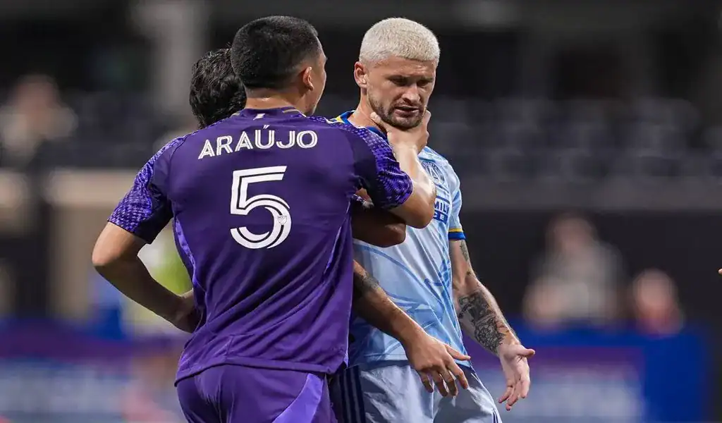 Orlando City player confronts Chicago Fire FC opponent during tense moment