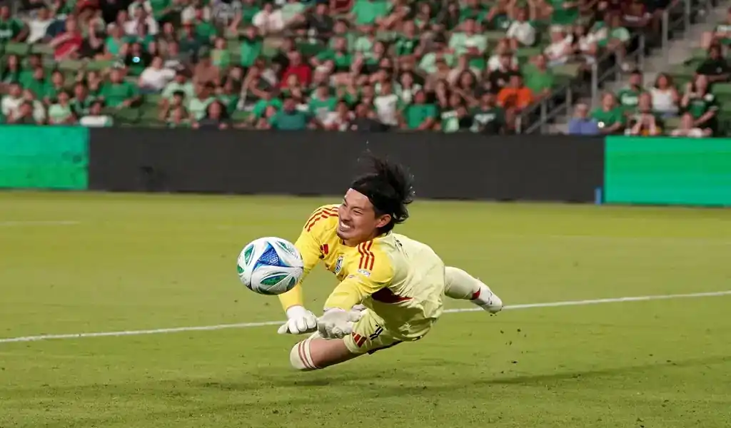 Real Salt Lake goalkeeper dives to make a save during match against Vancouver Whitecaps FC on May 24, 2025.