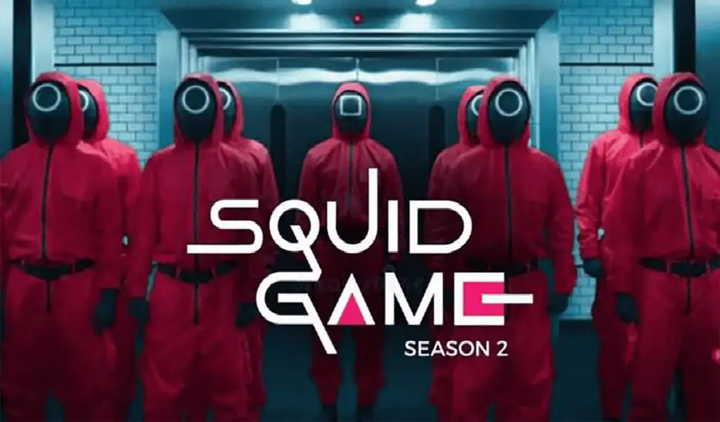 Guardias en trajes rojos de El Juego del Calamar frente a un ascensor en la temporada 2