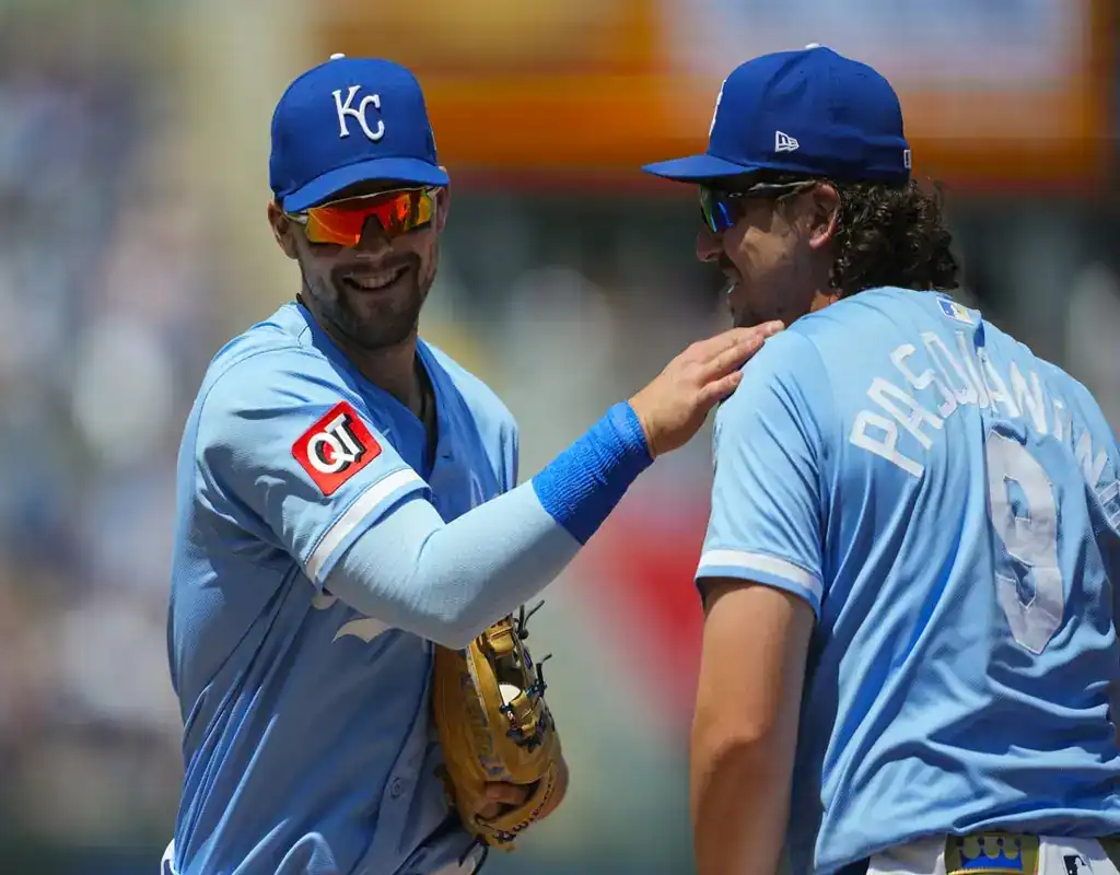 4 Kansas City Royals players share a laugh during May 14, 2025 MLB game vs Houston Astros