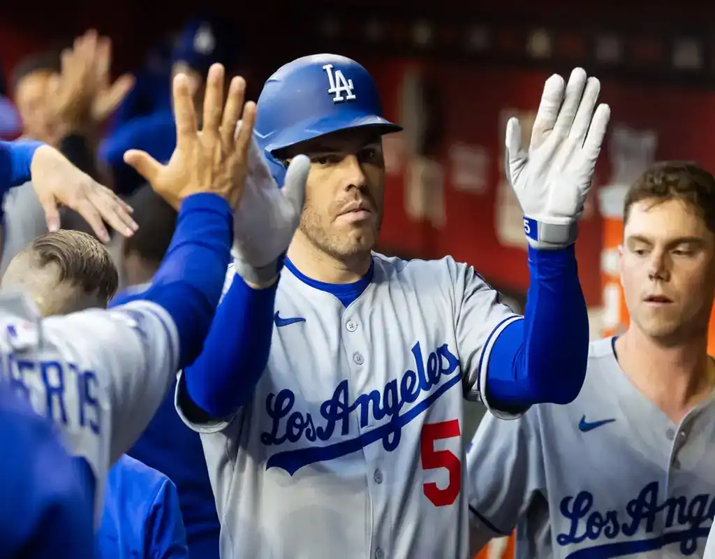Los Angeles Dodgers player celebrates in dugout during May 13, 2025 game vs Oakland Athletics