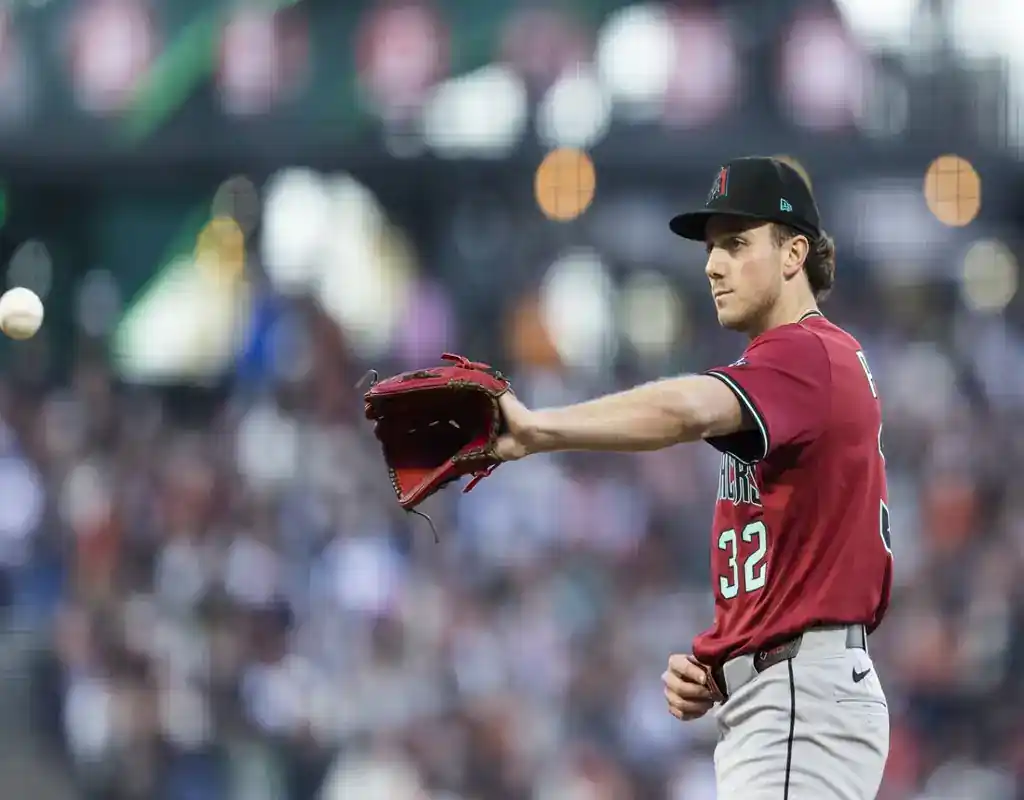 8 Arizona Diamondbacks pitcher prepares to catch the ball during the game against Los Angeles Dodgers on May 19, 2025
