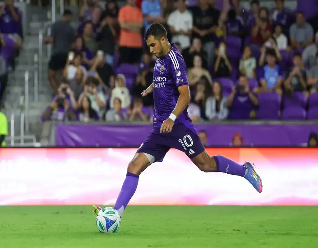 Orlando City SC player kicks ball during May 14, 2025 MLS match against Charlotte FC