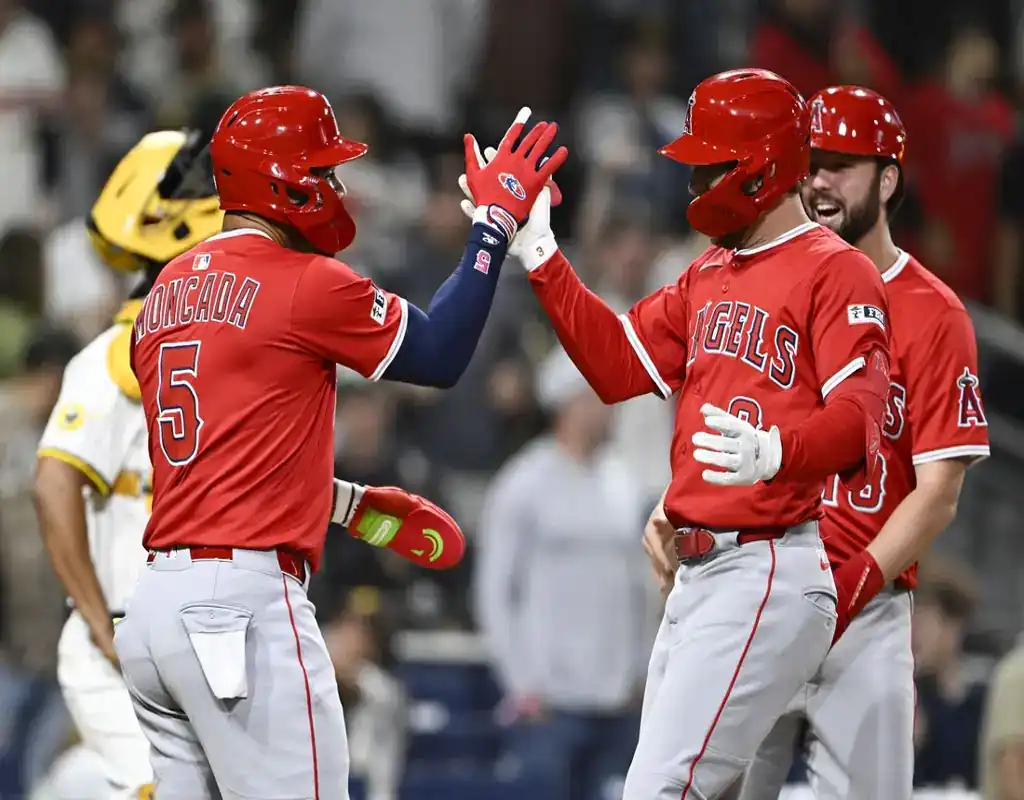 Los Angeles Angels players celebrate run scored against San Diego Padres on May 13, 2025