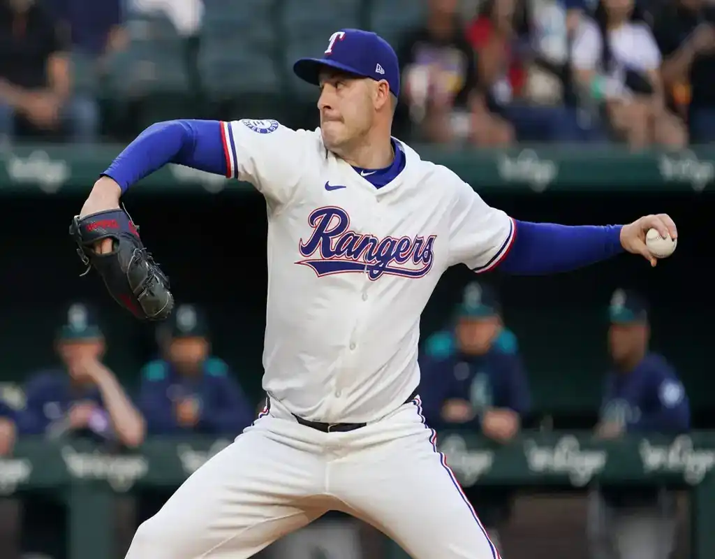 3 Texas Rangers pitcher delivers a pitch during May 14, 2025 MLB matchup vs Colorado Rockies