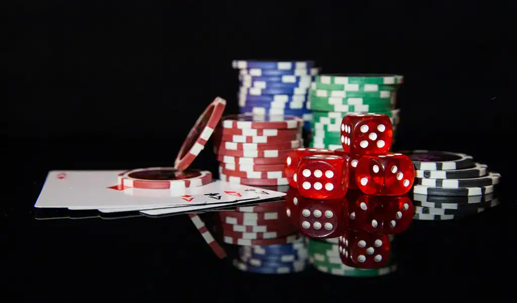 Poker chips, dice, and cards representing strategies for maximizing betting bonuses