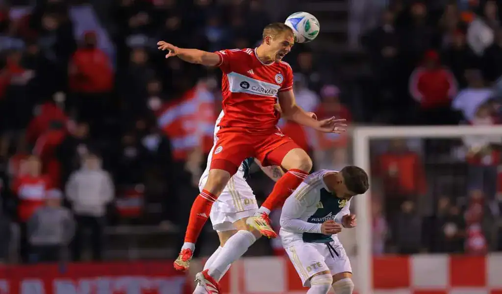 Chicago Fire FC player heads the ball during game against Nashville SC, June 14th 2025