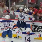 Edmonton Oilers players celebrate a goal against the Florida Panthers on June 14, 2025.