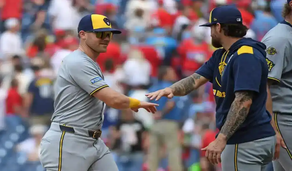8 Milwaukee Brewers players celebrate post-game following matchup against Cincinnati Reds on June 2, 2025
