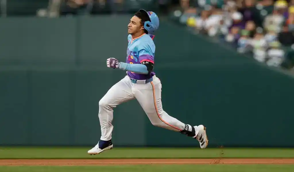 Colorado Rockies player sprints the bases during game against New York Mets on June 7, 2025