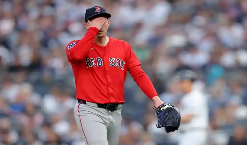Boston Red Sox pitcher reacts on mound during game against New York Yankees on June 7, 2025